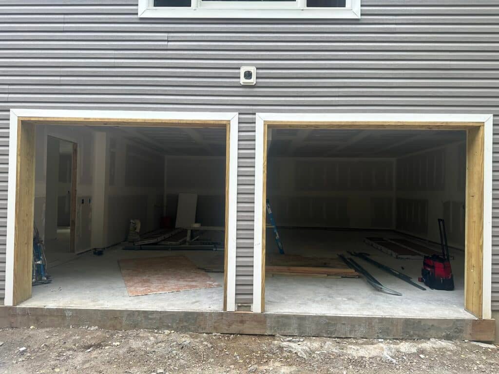 New Haas Doors 600 Series installed in Greenwich CT with LiftMaster 84505R openers