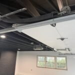 Garage door extension spring system before replacement – North Stamford CT